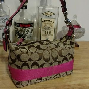 Coach signature and pink small handbag